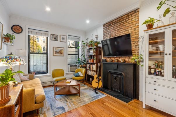 Fireplace, Interior, Living room, Recessed Lighting, Stone Walls, Wood Texture Flooring