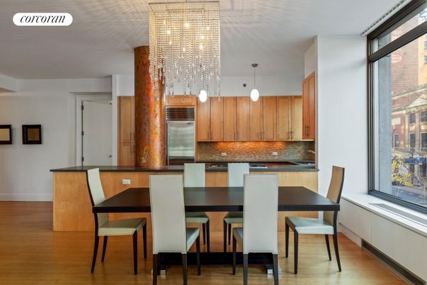 Chandelier, Dining room, Interior, Kitchen, Pendant Lights, Stainless Steel Appliances, Wood Texture Flooring
