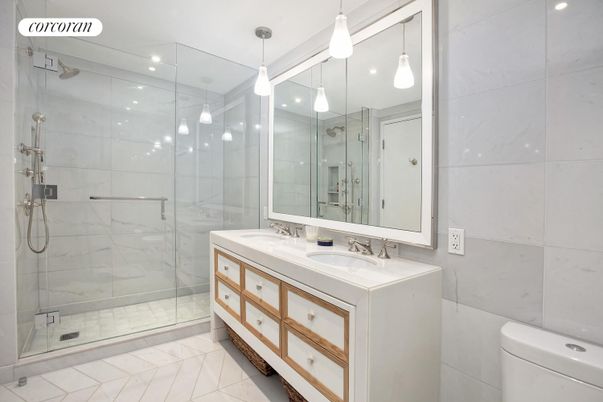 Bathroom, Dual Sink Vanities, Glass Shower, Interior, Marble Walls, Pendant Lights, Recessed Lighting