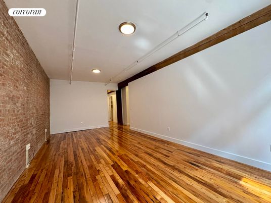 Empty room, Interior, Recessed Lighting, Stone Walls, Wood Texture Flooring