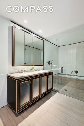 Bathroom, Dual Sink Vanities, Glass Shower, Interior, Recessed Lighting, Wood Texture Flooring