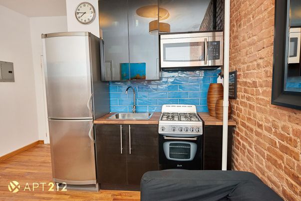 Interior, Kitchen, Stainless Steel Appliances, Stone Walls, Wood Texture Flooring
