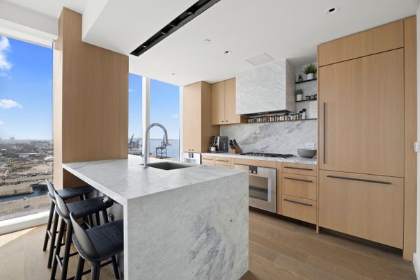 Interior, Kitchen, Marble Walls, Recessed Lighting, Stainless Steel Appliances, Wood Texture Flooring