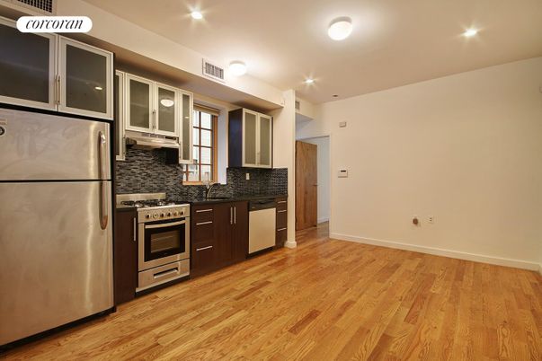 Interior, Kitchen, Recessed Lighting, Stainless Steel Appliances, Wood Texture Flooring