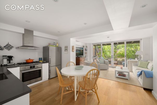Dining room, Interior, Kitchen, Living room, Recessed Lighting, Stainless Steel Appliances, Wood Texture Flooring