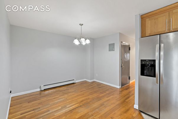 Empty room, Interior, Kitchen, Pendant Lights, Stainless Steel Appliances, Wood Texture Flooring