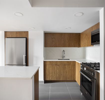 Interior, Kitchen, Marble Walls, Recessed Lighting, Stainless Steel Appliances