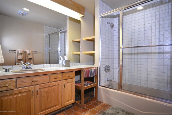 Bathroom, Dual Sink Vanities, Glass Shower, Interior, Recessed Lighting, Tile Countertops