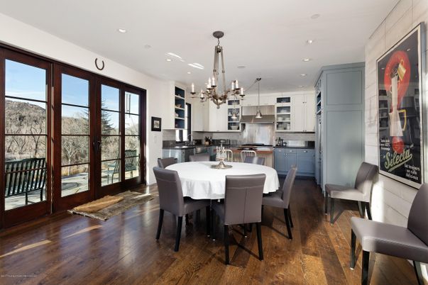 Chandelier, Dining room, Interior, Kitchen, Recessed Lighting, Stainless Steel Appliances, Wood Texture Flooring