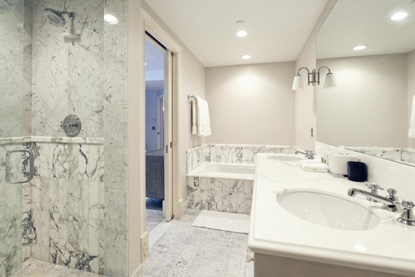 Bathroom, Dual Sink Vanities, Glass Shower, Interior, Marble Walls, Recessed Lighting