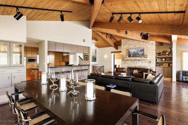 Dining room, Fireplace, Interior, Kitchen, Living room, Pendant Lights, Stainless Steel Appliances, Stone Walls, Wooden Beams, Wooden Ceilings, Wood Texture Flooring