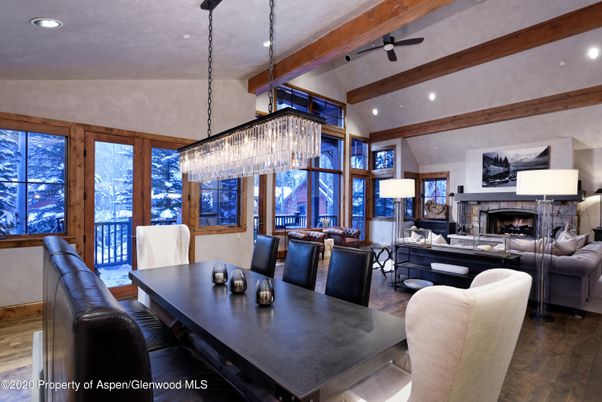 Chandelier, Dining room, Fireplace, Interior, Living room, Recessed Lighting, Wooden Beams, Wood Texture Flooring
