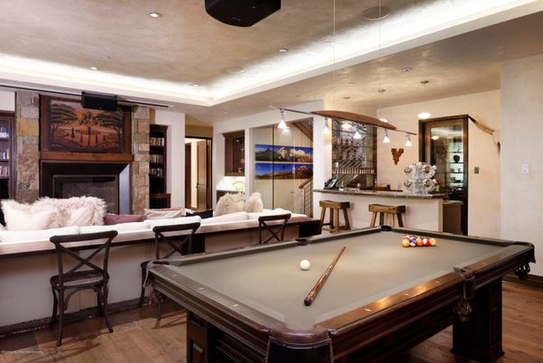 Billiard Table, Fireplace, Game Room, Interior, Living room, Pendant Lights, Recessed Lighting, Wood Texture Flooring