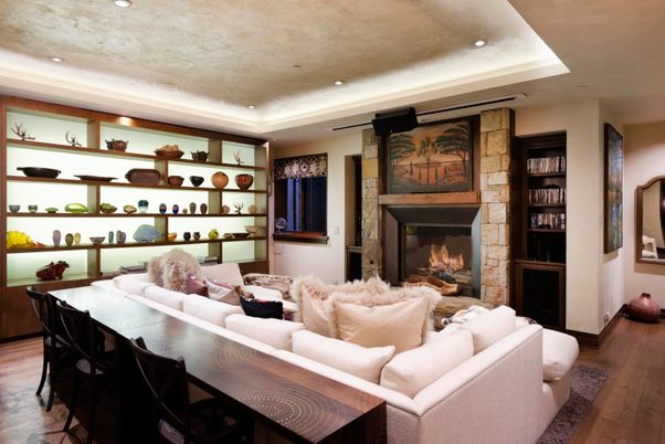 Dining room, Fireplace, Interior, Living room, Recessed Lighting, Stone Walls, Wood Texture Flooring
