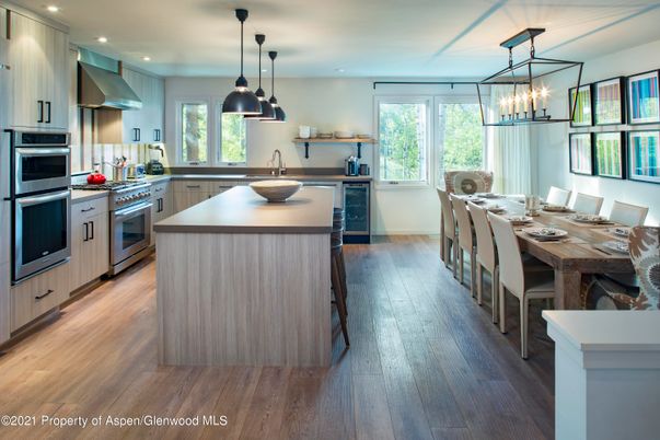 Dining room, Interior, Kitchen, Pendant Lights, Recessed Lighting, Stainless Steel Appliances, Wood Texture Flooring