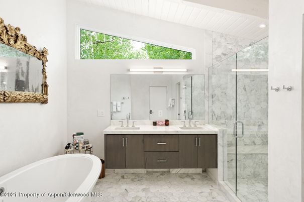 Bathroom, Dual Sink Vanities, Free Standing Baths, Glass Shower, Interior, Marble, Marble Walls, Recessed Lighting