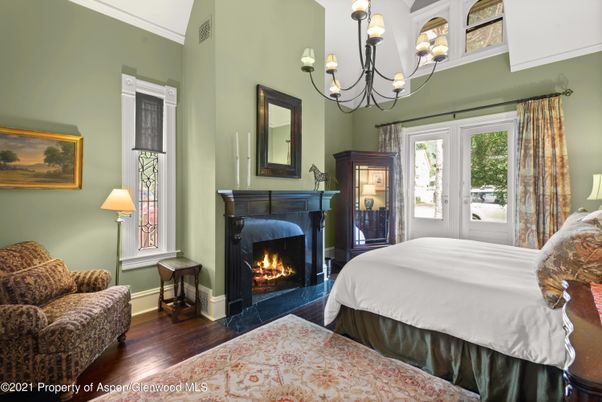 Bedroom, Chandelier, Fireplace, Interior, Wood Texture Flooring