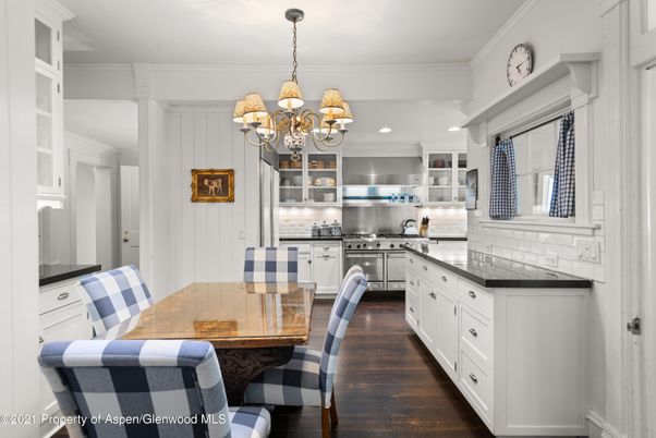 Chandelier, Dining room, Interior, Kitchen, Recessed Lighting, Stainless Steel Appliances, Wood Texture Flooring