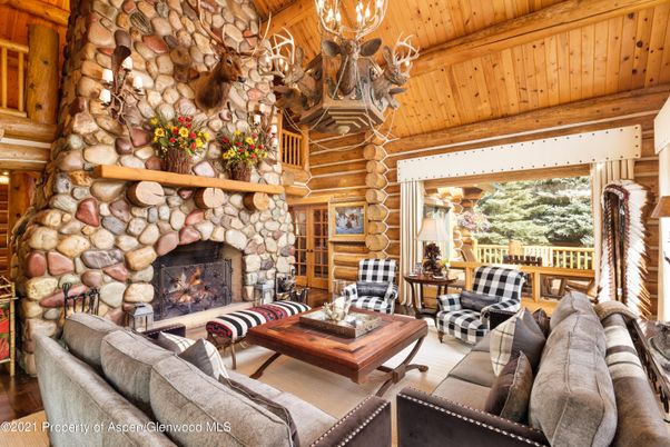 Chandelier, Fireplace, Interior, Living room, Stone Walls, Wooden Beams, Wooden Ceilings