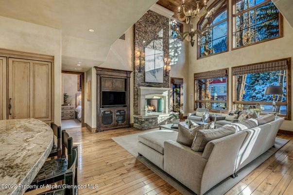 Chandelier, Fireplace, Interior, Living room, Recessed Lighting, Wood Texture Flooring