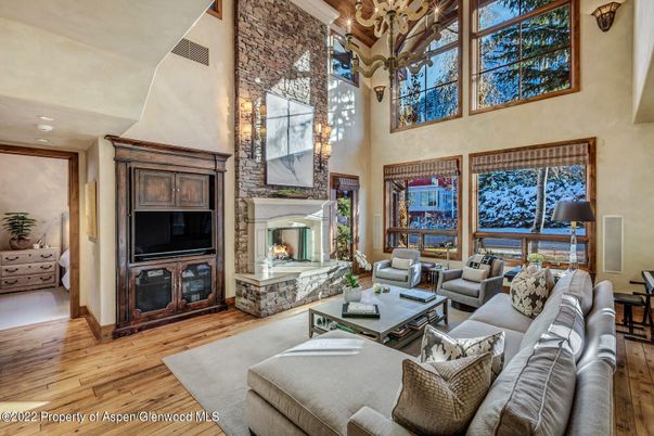 Chandelier, Fireplace, Interior, Living room, Recessed Lighting, Wood Texture Flooring