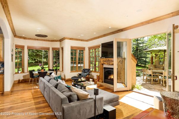 Dining room, Fireplace, Interior, Living room, Recessed Lighting, Wood Texture Flooring