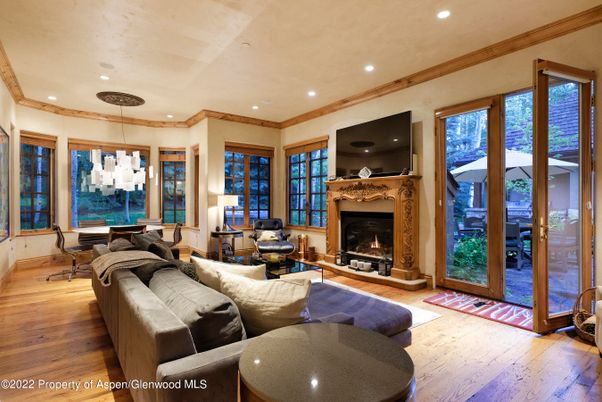 Dining room, Fireplace, Interior, Living room, Pendant Lights, Recessed Lighting, Wood Texture Flooring