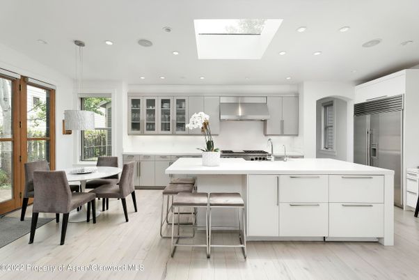 Dining room, Interior, Kitchen, Pendant Lights, Recessed Lighting, Stainless Steel Appliances, Wood Texture Flooring