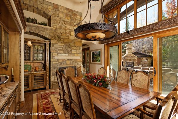 Dining room, Fireplace, Interior, Pendant Lights, Stone Walls, Wood Texture Flooring