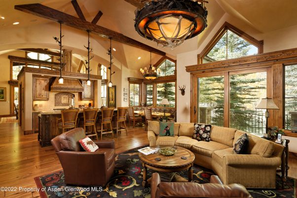Chandelier, Dining room, Interior, Kitchen, Living room, Pendant Lights, Recessed Lighting, Wooden Beams, Wood Texture Flooring