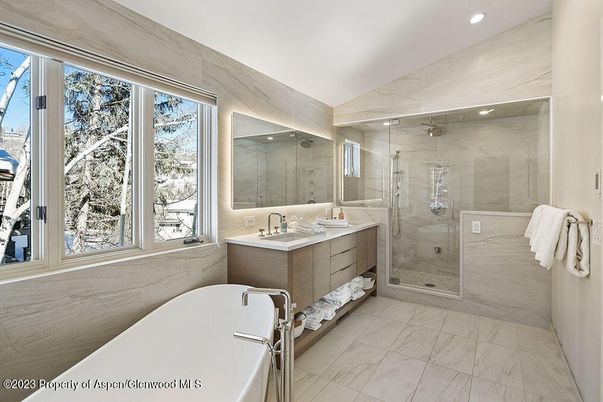 Bathroom, Dual Sink Vanities, Free Standing Baths, Glass Shower, Interior, Marble, Marble Walls, Recessed Lighting