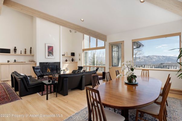 Dining room, Fireplace, Interior, Living room, Recessed Lighting, Wood Texture Flooring