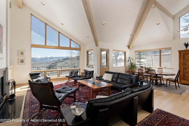Dining room, Fireplace, Interior, Living room, Recessed Lighting, Wooden Beams, Wood Texture Flooring