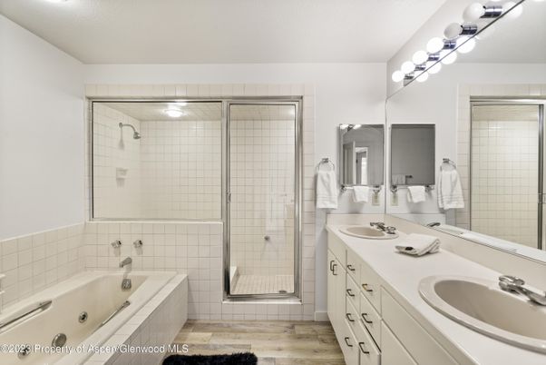 Bathroom, Dual Sink Vanities, Glass Shower, Interior, Wood Texture Flooring
