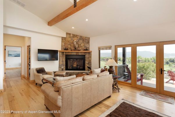 Fireplace, Interior, Living room, Recessed Lighting, Stone Walls, Wooden Beams, Wood Texture Flooring