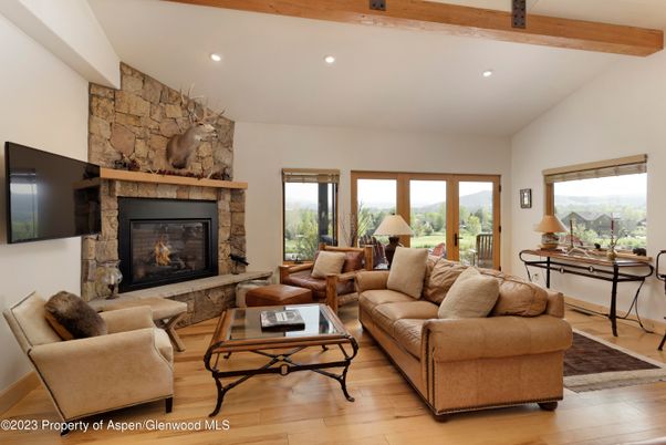 Fireplace, Interior, Living room, Recessed Lighting, Stone Walls, Wooden Beams, Wood Texture Flooring