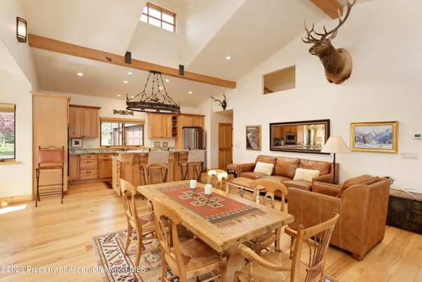Dining room, Interior, Kitchen, Living room, Pendant Lights, Recessed Lighting, Stainless Steel Appliances, Wooden Beams, Wood Texture Flooring