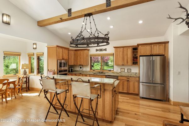 Chandelier, Interior, Kitchen, Pendant Lights, Recessed Lighting, Stainless Steel Appliances, Wooden Beams, Wood Texture Flooring