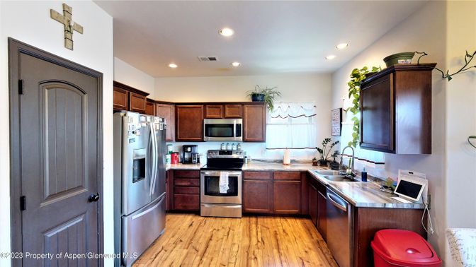 Interior, Kitchen, Recessed Lighting, Stainless Steel Appliances, Wood Texture Flooring