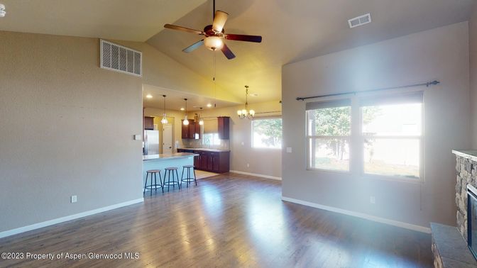 Empty room, Fireplace, Interior, Kitchen, Pendant Lights, Wood Texture Flooring