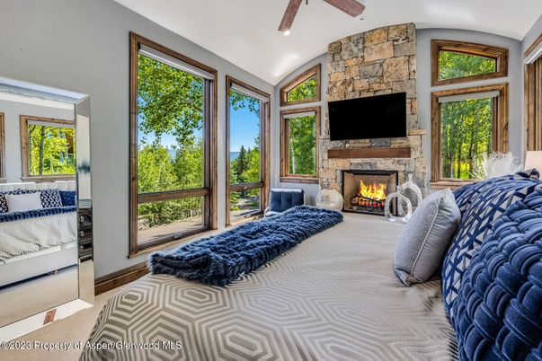 Bedroom, Fireplace, Interior, Recessed Lighting, Stone Walls