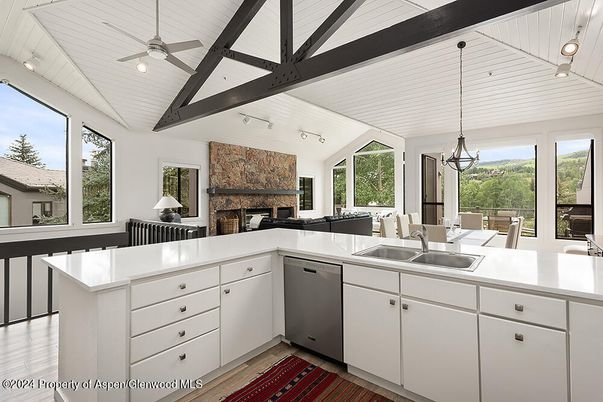 Dining room, Fireplace, Interior, Kitchen, Pendant Lights, Recessed Lighting, Stone Walls, Wooden Beams, Wood Texture Flooring