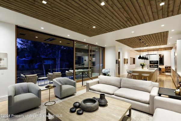 Dining room, Interior, Kitchen, Living room, Pendant Lights, Recessed Lighting, Stainless Steel Appliances, Wooden Ceilings, Wood Texture Flooring