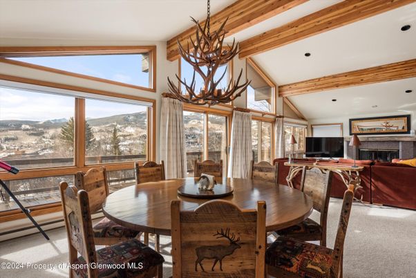 Chandelier, Dining room, Fireplace, Interior, Living room, Recessed Lighting, Wooden Beams