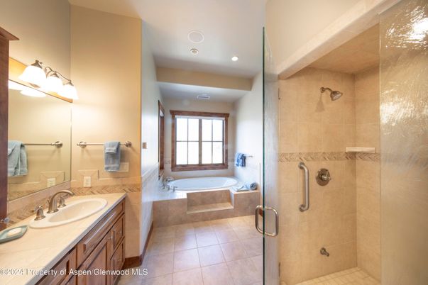 Bathroom, Dual Sink Vanities, Glass Shower, Interior, Recessed Lighting, Tile Countertops