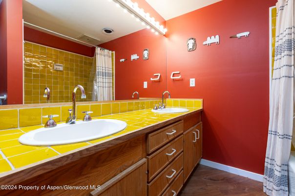Bathroom, Dual Sink Vanities, Interior, Tile Countertops, Wood Texture Flooring