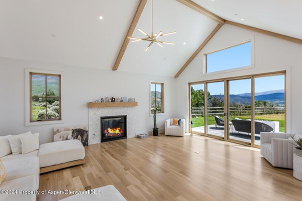 Fireplace, Interior, Living room, Pendant Lights, Recessed Lighting, Wooden Beams, Wood Texture Flooring