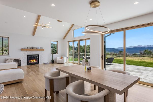 Dining room, Fireplace, Interior, Pendant Lights, Recessed Lighting, Wood Texture Flooring