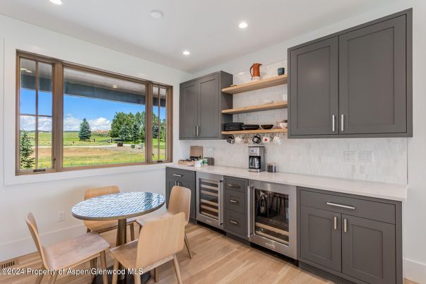Dining room, Interior, Kitchen, Recessed Lighting, Stainless Steel Appliances, Wood Texture Flooring