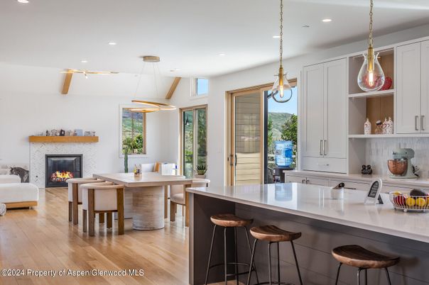 Dining room, Fireplace, Interior, Kitchen, Pendant Lights, Recessed Lighting, Wood Texture Flooring